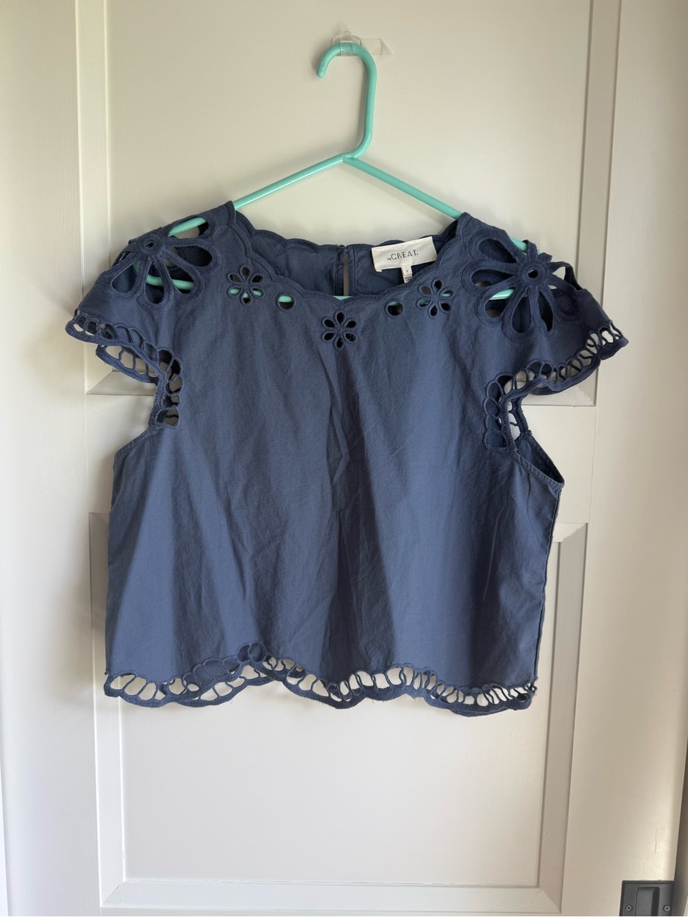 THE GREAT. Navy Eyelet Flutter Sleeve Blouse